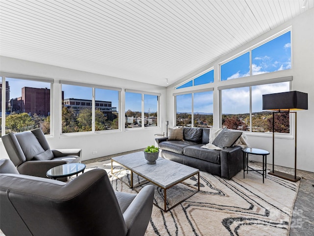 sunroom featuring vaulted ceiling