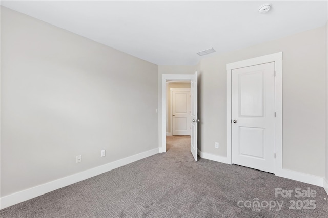 unfurnished bedroom featuring carpet flooring