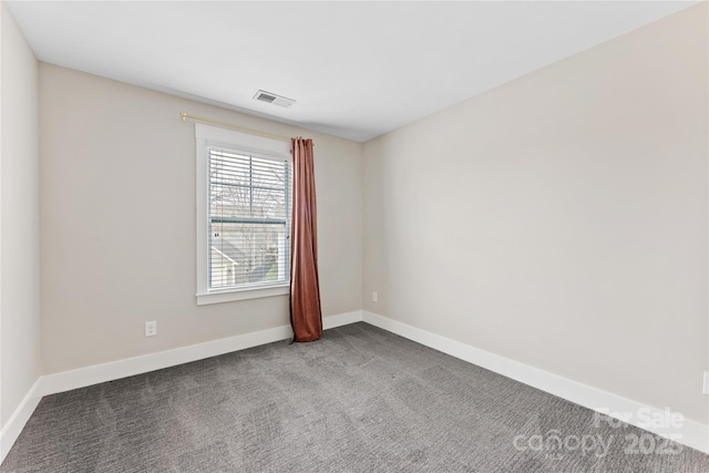 unfurnished room with carpet floors