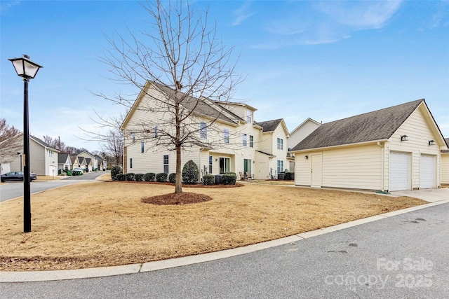 front of property with a garage