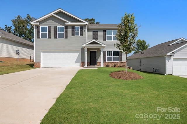 view of front of house with a garage and a front lawn