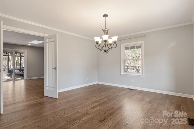 unfurnished room with crown molding, plenty of natural light, and dark hardwood / wood-style floors