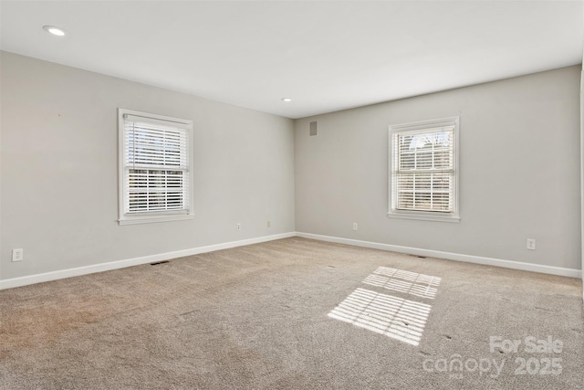 view of carpeted spare room