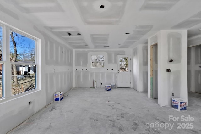 spare room featuring coffered ceiling