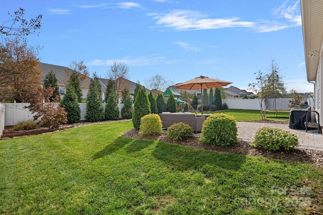 view of yard with a trampoline, an outdoor hangout area, and a patio area