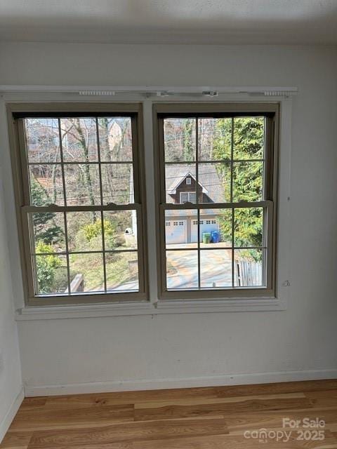 16 Castle St, Asheville, NC 28803 - interior details featuring baseboards and wood finished floors