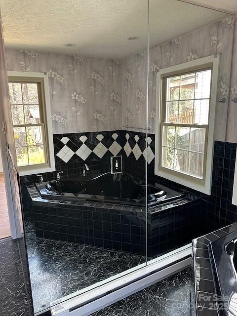 16 Castle St, Asheville, NC 28803 - kitchen with marble finish floor and a textured ceiling