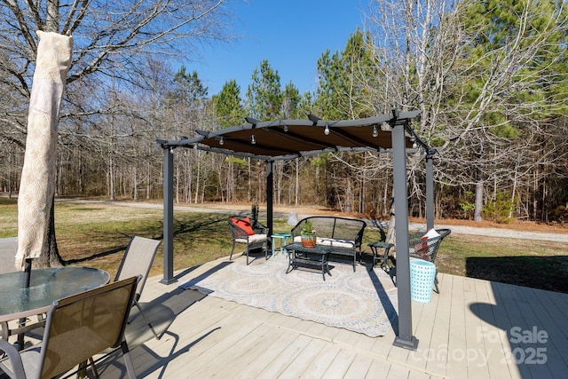 deck featuring an outdoor hangout area, a yard, and a pergola