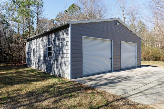 garage with a yard