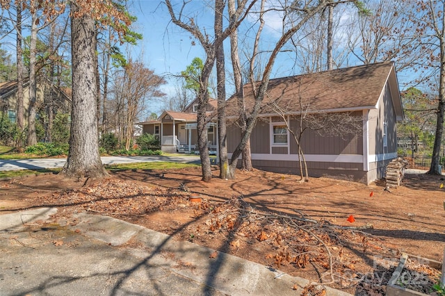 view of front of home featuring a shingled roof