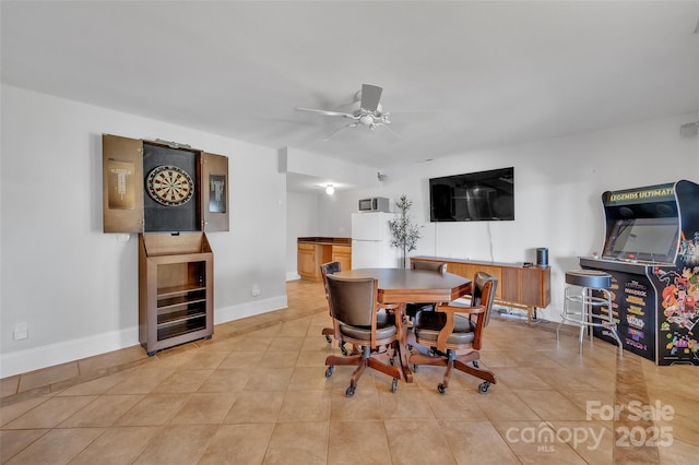 dining room featuring light tile patterned floors, beverage cooler, baseboards, and ceiling fan