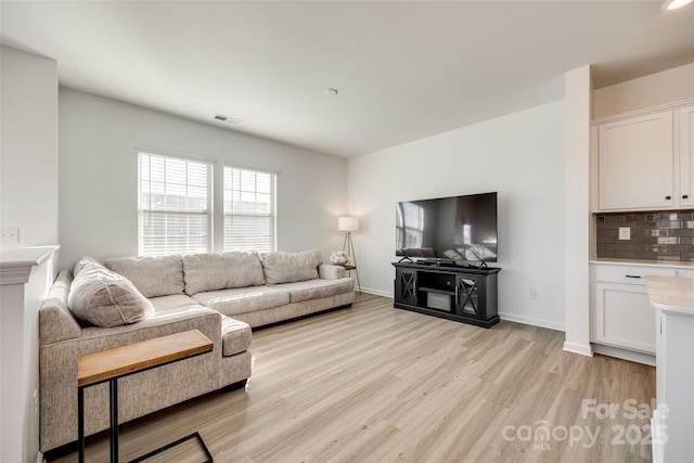 living room featuring light hardwood / wood-style flooring