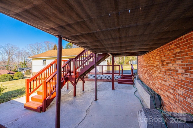 view of patio with a wooden deck