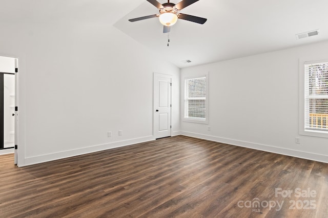 unfurnished room with ceiling fan, lofted ceiling, and dark hardwood / wood-style flooring