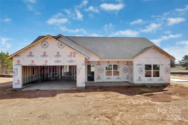 property in mid-construction featuring an attached garage