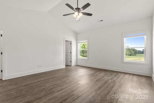 5177 Flay Rd, Lincolnton, NC 28021 - spare room featuring ceiling fan, dark wood-style flooring, baseboards, and high vaulted ceiling