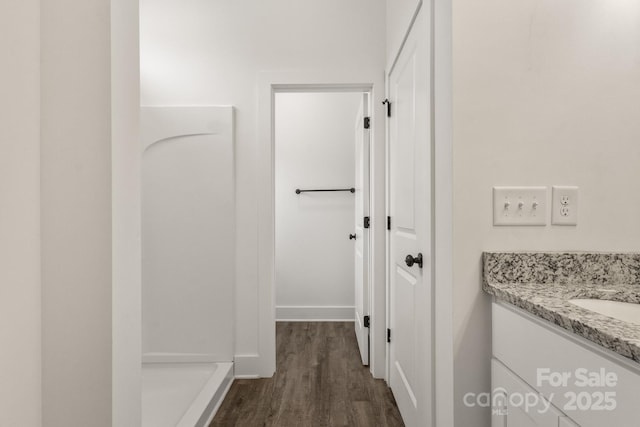 5177 Flay Rd, Lincolnton, NC 28021 - bathroom featuring wood finished floors, vanity, and baseboards
