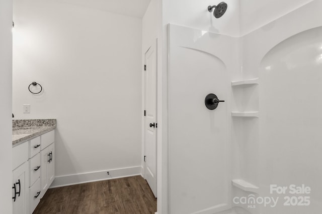 5177 Flay Rd, Lincolnton, NC 28021 - bathroom featuring wood finished floors, a shower, and vanity