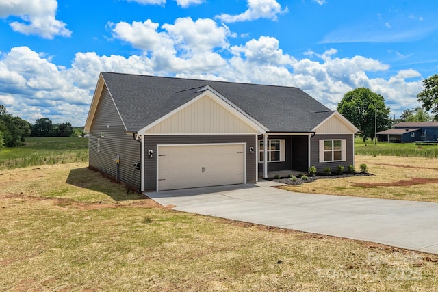 5177 Flay Rd, Lincolnton, NC 28021 - view of front facade with an attached garage, driveway, a front yard, and roof with shingles