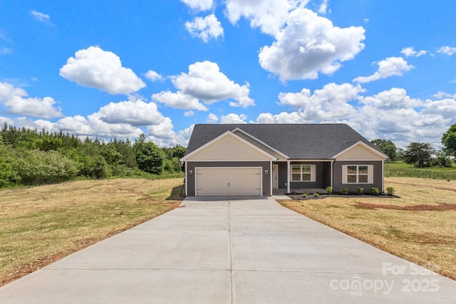 5177 Flay Rd, Lincolnton, NC 28021 - view of front of house featuring driveway, a garage, a front lawn, and a shingled roof
