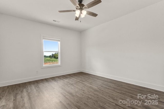 5177 Flay Rd, Lincolnton, NC 28021 - unfurnished room featuring dark wood-style floors, baseboards, and ceiling fan