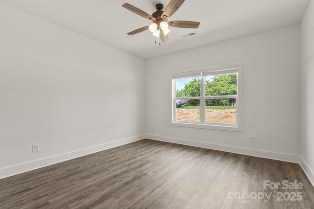 5177 Flay Rd, Lincolnton, NC 28021 - spare room with dark wood finished floors, baseboards, and ceiling fan