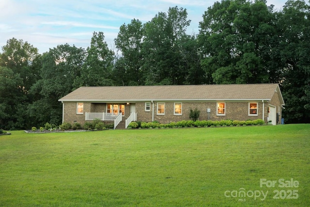 4816 Zion Church Rd, Concord, NC 28025 - ranch-style house with a porch, a front lawn, and an attached garage