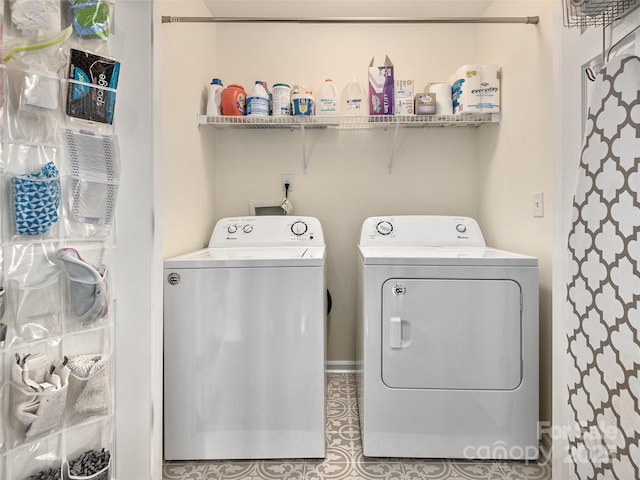 laundry room with washing machine and dryer