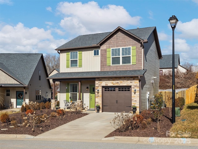 craftsman house with a garage and covered porch