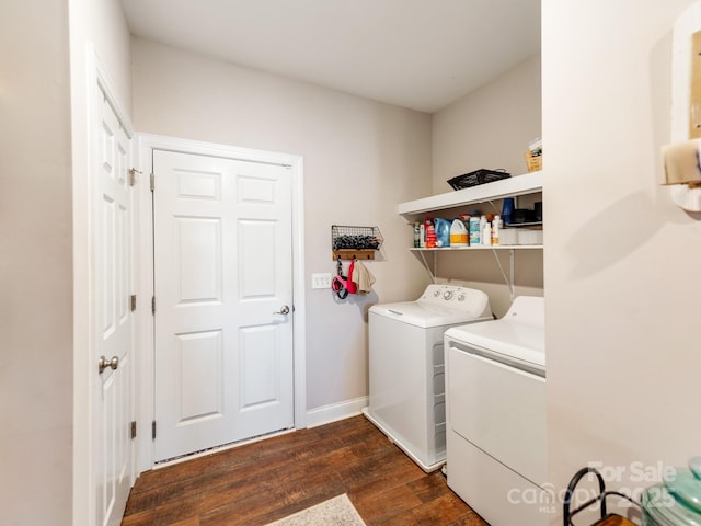 washroom featuring independent washer and dryer and dark hardwood / wood-style flooring