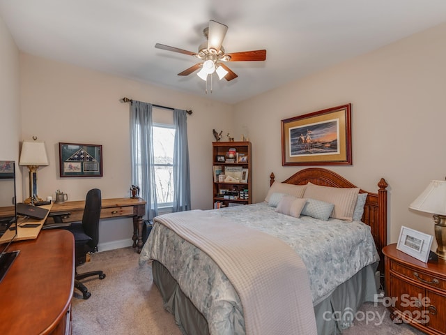 bedroom with light colored carpet and ceiling fan