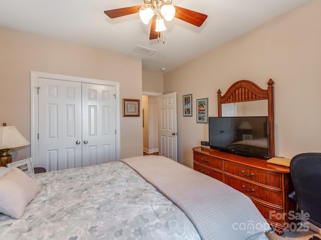 bedroom featuring a closet and ceiling fan