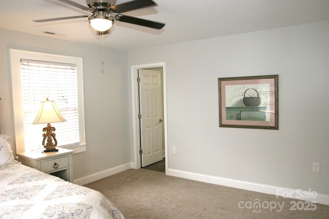 unfurnished bedroom featuring ceiling fan and carpet flooring