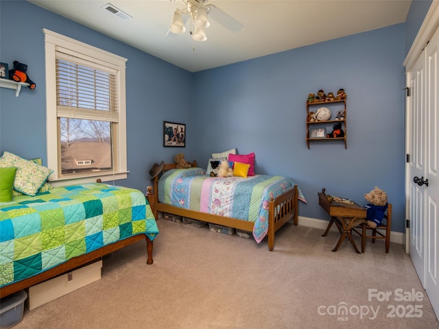 carpeted bedroom featuring ceiling fan