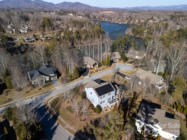 bird's eye view featuring a water and mountain view