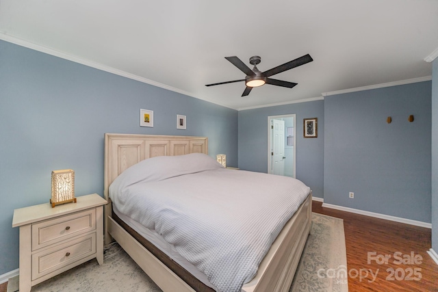 bedroom with ornamental molding, ceiling fan, and light hardwood / wood-style floors