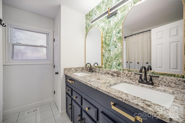 bathroom featuring vanity and tile patterned flooring