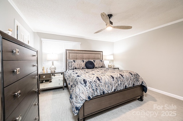 carpeted bedroom with crown molding, ceiling fan, and a textured ceiling