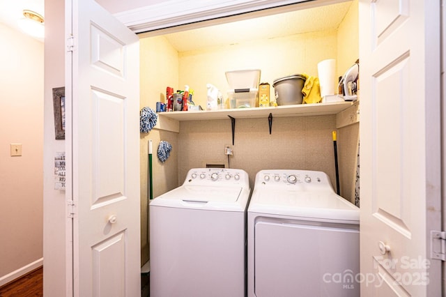 washroom featuring washer and dryer