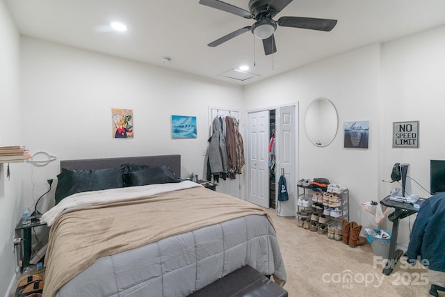 bedroom with a closet, ceiling fan, and carpet flooring