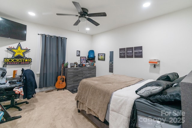 carpeted bedroom with ceiling fan