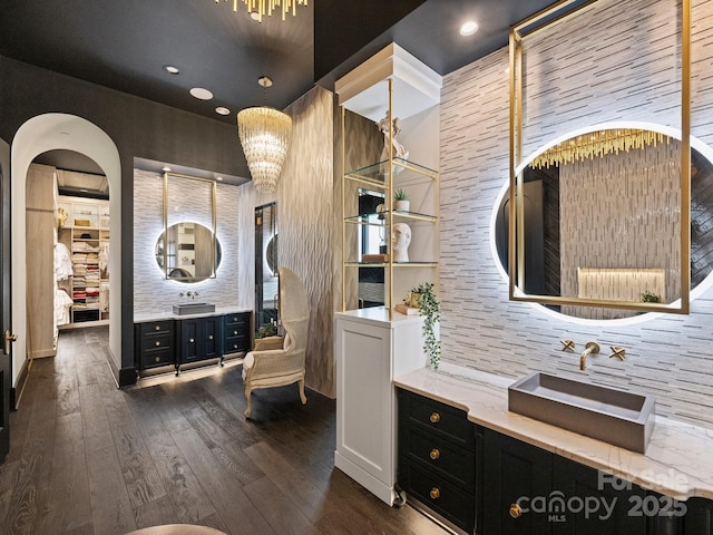 bathroom with vanity and hardwood / wood-style floors