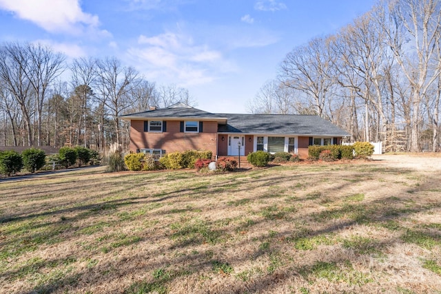 view of front of property with a front lawn