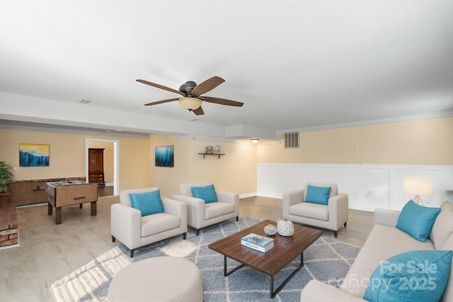 living room featuring ceiling fan