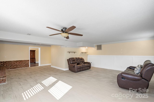 living room with ceiling fan