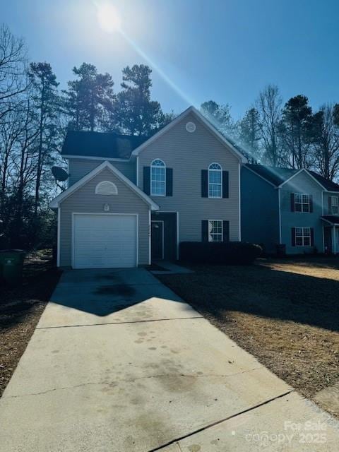 view of front property with a garage