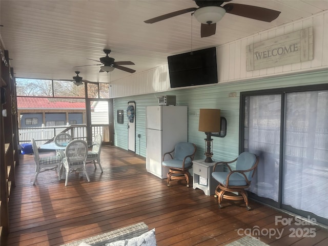 interior space featuring ceiling fan