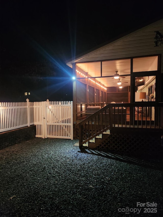 view of yard at night