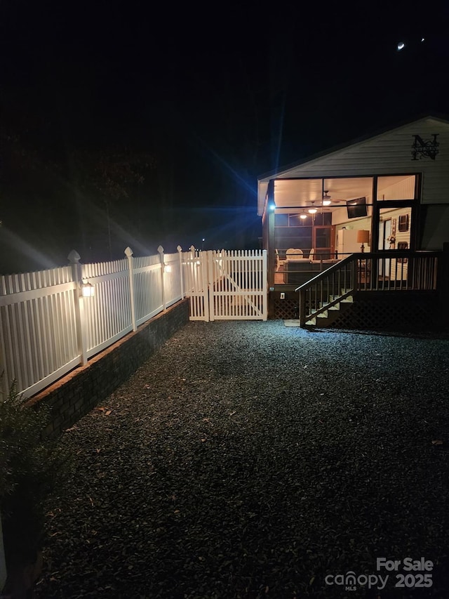 view of yard at night