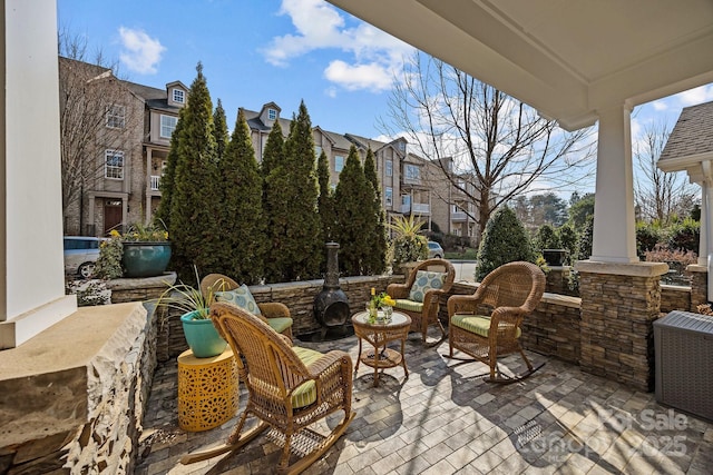 view of patio featuring a porch